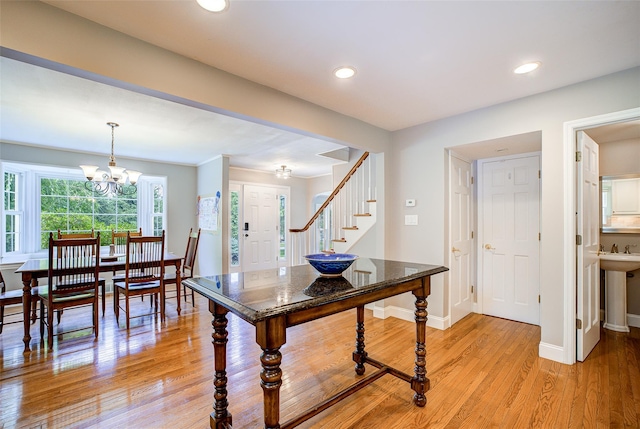 14 Flower Hill Rd, Poughkeepsie, NY 12603 - dining area with stairway, light wood-type flooring, recessed lighting, and a chandelier