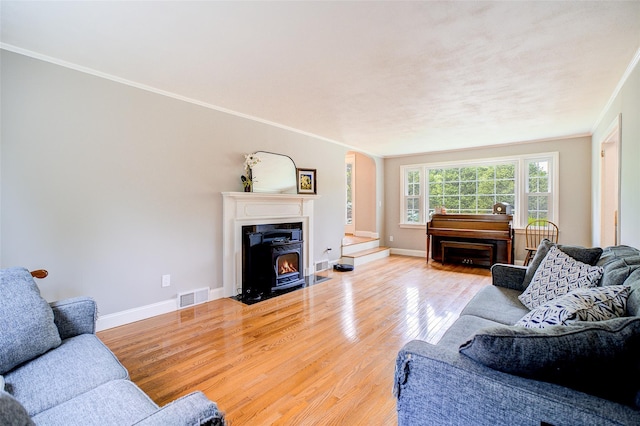 14 Flower Hill Rd, Poughkeepsie, NY 12603 - living room with wood finished floors, crown molding, and arched walkways