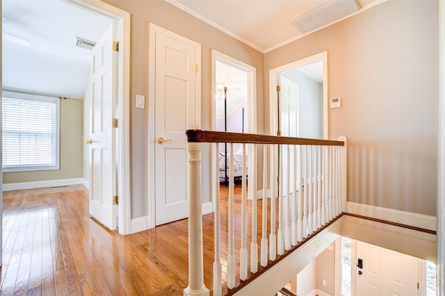 14 Flower Hill Rd, Poughkeepsie, NY 12603 - corridor with light wood finished floors and ornamental molding