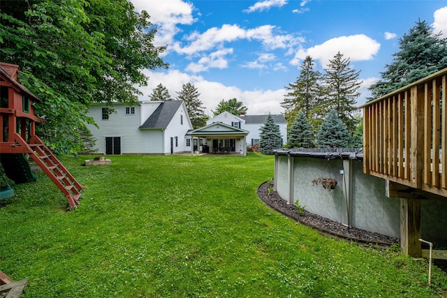 14 Flower Hill Rd, Poughkeepsie, NY 12603 - view of green lawn featuring a playground