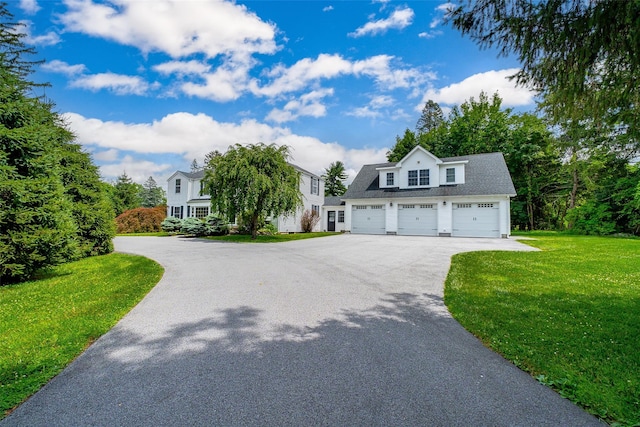 14 Flower Hill Rd, Poughkeepsie, NY 12603 - view of front of house with asphalt driveway and a front lawn