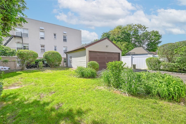 108 N Forest Ave, Rockville Centre, NY 11570 - view of yard featuring an outdoor structure and a garage