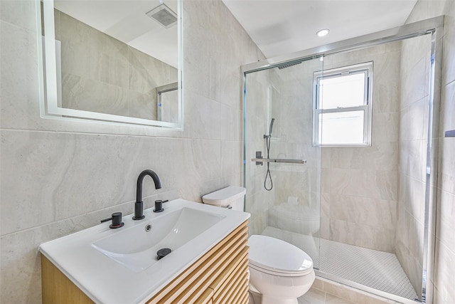 108 N Forest Ave, Rockville Centre, NY 11570 - full bath with tile walls, a shower stall, and vanity
