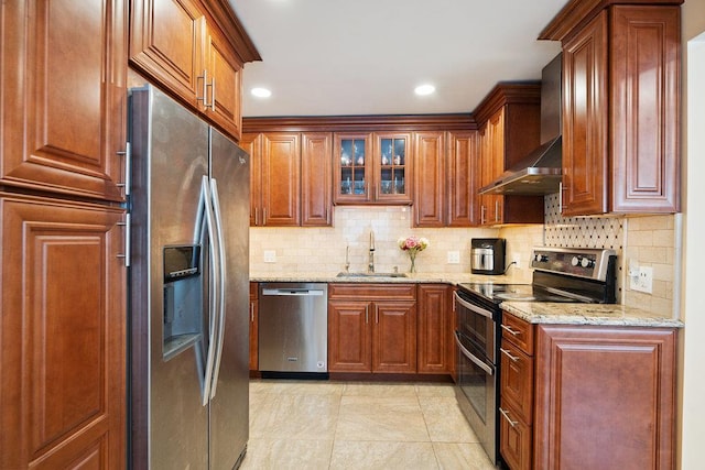 11 Sunrise St, Plainview, NY 11803 - kitchen with stainless steel appliances, wall chimney exhaust hood, backsplash, light stone countertops, and recessed lighting