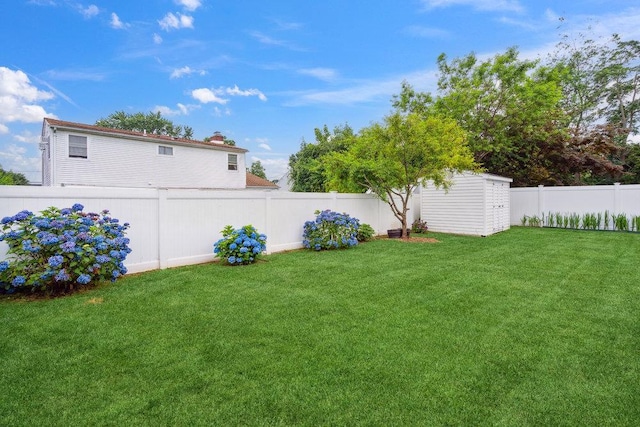 11 Sunrise St, Plainview, NY 11803 - fenced backyard featuring a storage unit