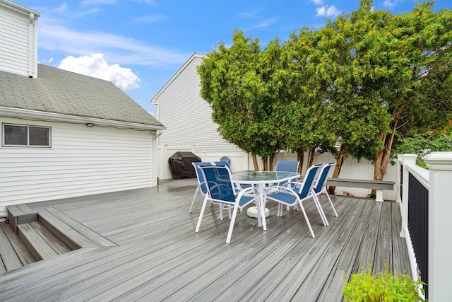 11 Sunrise St, Plainview, NY 11803 - wooden terrace featuring a grill and outdoor dining space