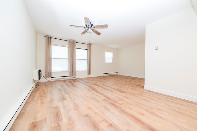 27A Walden Ct Unit A, Yorktown Heights, NY 10598 - spare room with baseboard heating, light wood-style flooring, and a ceiling fan