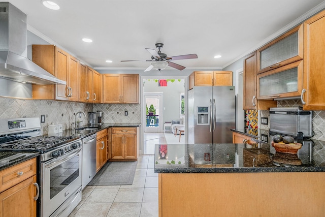 43 Ranch Dr, Shirley, NY 11967 - kitchen with stainless steel appliances, wall chimney exhaust hood, backsplash, a ceiling fan, and a peninsula