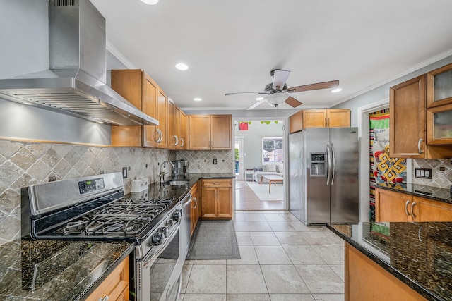 43 Ranch Dr, Shirley, NY 11967 - kitchen with stainless steel appliances, wall chimney range hood, ceiling fan, tasteful backsplash, and ornamental molding