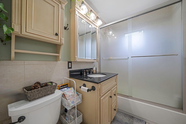 43 Ranch Dr, Shirley, NY 11967 - full bathroom featuring vanity, enclosed tub / shower combo, backsplash, and tile walls
