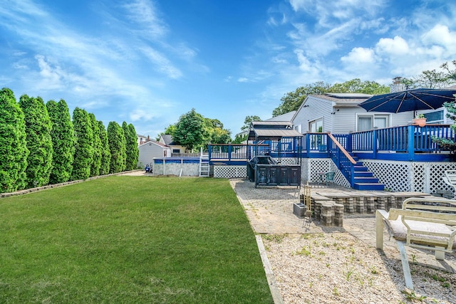 43 Ranch Dr, Shirley, NY 11967 - view of grassy yard featuring a deck, a patio, a covered pool, and a gazebo