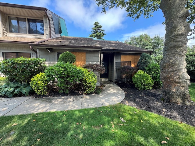 1 Stanford Ct Unit 1, Wantagh, NY 11793 - view of front facade featuring a shingled roof