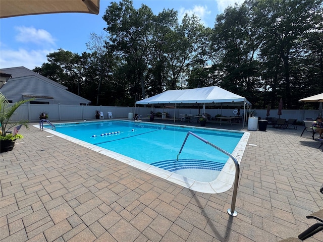 1 Stanford Ct Unit 1, Wantagh, NY 11793 - community pool featuring a fenced backyard and a patio area
