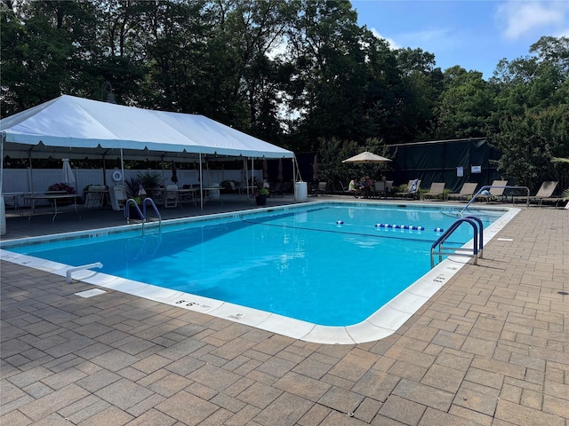 1 Stanford Ct Unit 1, Wantagh, NY 11793 - community pool with a patio area and a gazebo