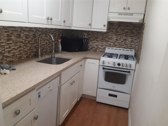 54-40 Little Neck Pkwy Unit 4M, Little Neck, NY 11362 - kitchen featuring under cabinet range hood, white appliances, white cabinetry, and dark wood-style flooring