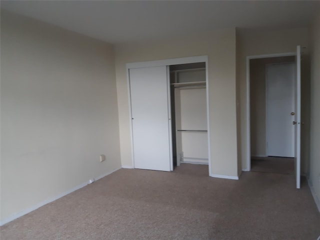 54-40 Little Neck Pkwy Unit 4M, Little Neck, NY 11362 - unfurnished bedroom with carpet flooring and a closet