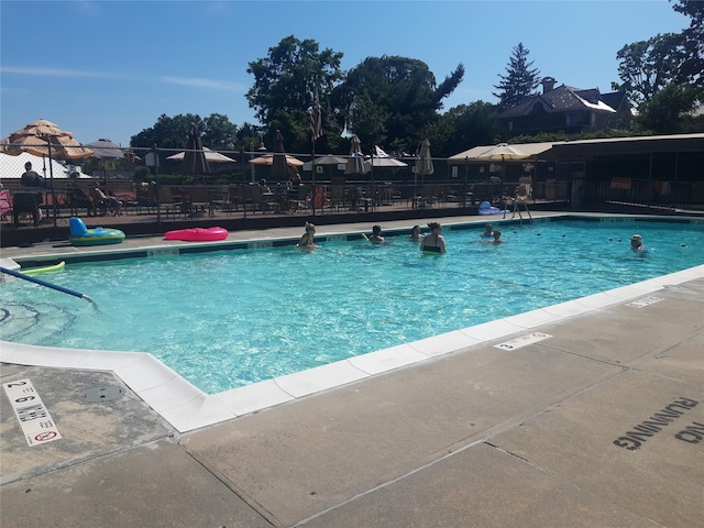 54-40 Little Neck Pkwy Unit 4M, Little Neck, NY 11362 - community pool featuring a patio area
