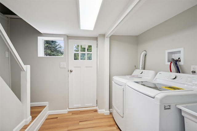 45 Juniper Dr, Lincolndale, NY 10541 - laundry room with light wood finished floors and independent washer and dryer