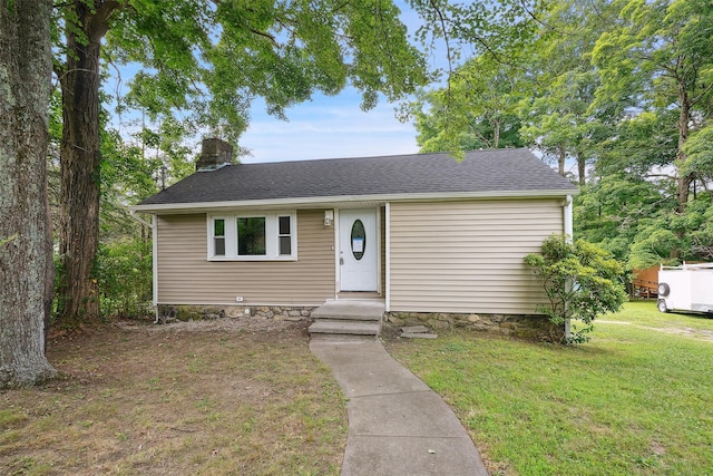 45 Juniper Dr, Lincolndale, NY 10541 - view of front of property with a front yard, a chimney, and a shingled roof