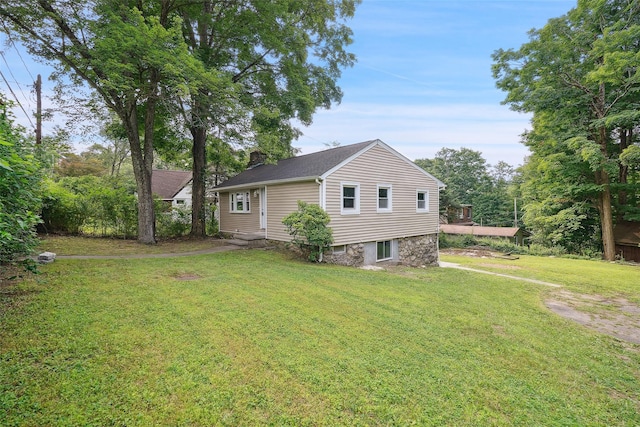 45 Juniper Dr, Lincolndale, NY 10541 - view of side of home featuring a lawn and a chimney