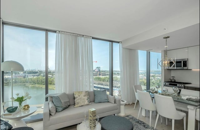 131-01 40th Rd Unit 11N, Flushing, NY 11354 - living area with floor to ceiling windows, a chandelier, and a view of city