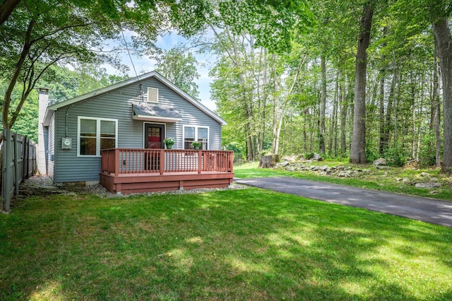 3 Preston Pl, Patterson, NY 12563 - view of front of home featuring a wooden deck and a chimney