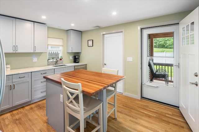 3 Preston Pl, Patterson, NY 12563 - kitchen featuring gray cabinets, plenty of natural light, wood counters, stainless steel dishwasher, and recessed lighting