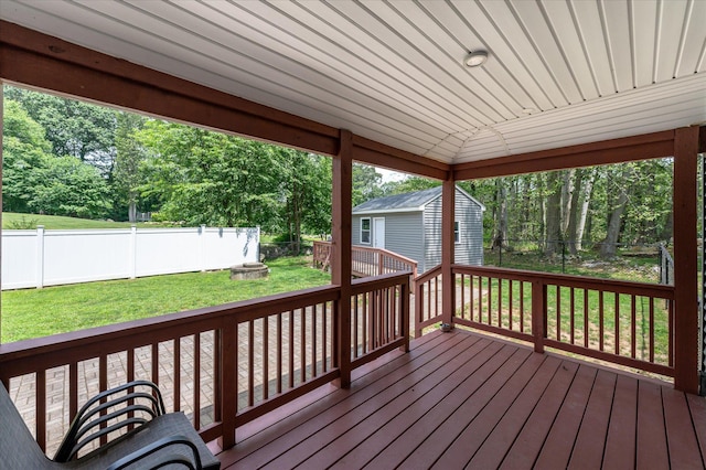 3 Preston Pl, Patterson, NY 12563 - deck featuring a fenced backyard, an outdoor structure, a fire pit, and view of scattered trees