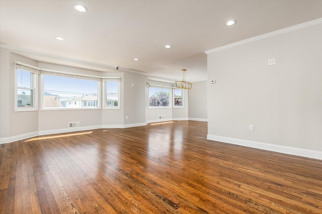 160-46 84th St, Howard Beach, NY 11414 - empty room with crown molding, a chandelier, dark wood-type flooring, and recessed lighting