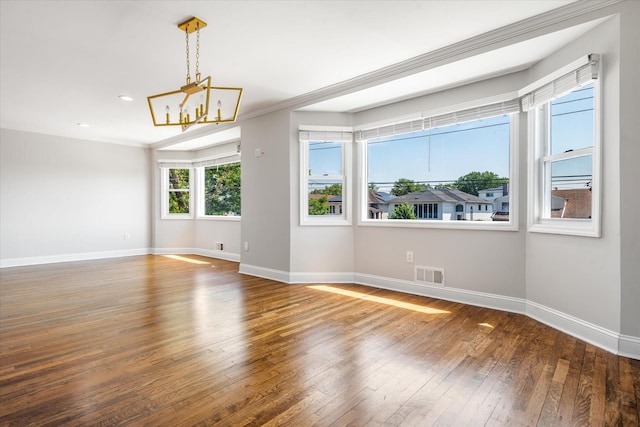 160-46 84th St, Howard Beach, NY 11414 - empty room with a chandelier, wood-type flooring, recessed lighting, and ornamental molding