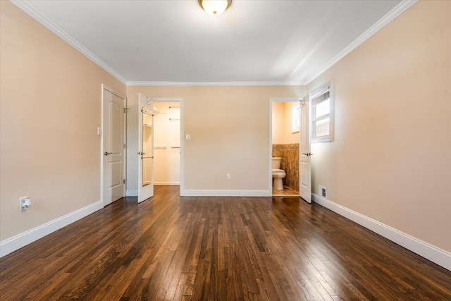 160-46 84th St, Howard Beach, NY 11414 - unfurnished bedroom featuring dark wood-type flooring, crown molding, and connected bathroom