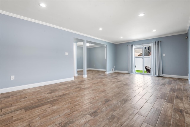 160-46 84th St, Howard Beach, NY 11414 - empty room with wood finished floors, recessed lighting, and crown molding