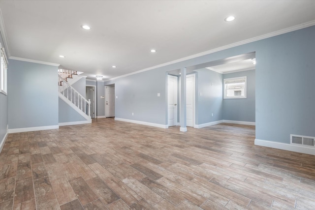 160-46 84th St, Howard Beach, NY 11414 - unfurnished living room with light wood finished floors, stairway, recessed lighting, and ornamental molding