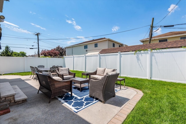 160-46 84th St, Howard Beach, NY 11414 - fenced backyard featuring an outdoor living space and a patio area