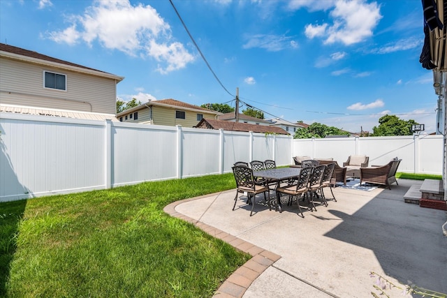 160-46 84th St, Howard Beach, NY 11414 - fenced backyard with a patio, outdoor lounge area, and outdoor dining area