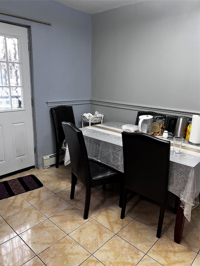 4153 Bruner Ave, Bronx, NY 10466 - dining room featuring light tile patterned floors and a baseboard heating unit