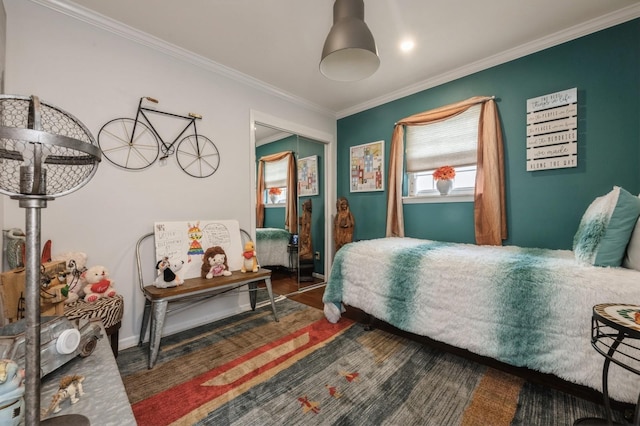 3300 Walters Ave, Wantagh, NY 11793 - bedroom with ornamental molding, wood finished floors, and a closet