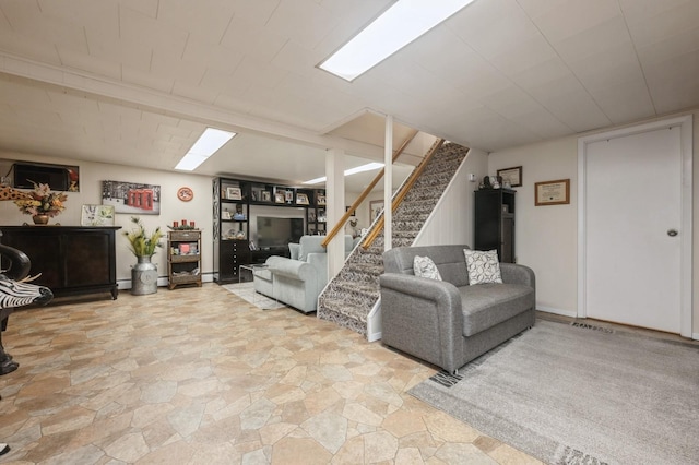 3300 Walters Ave, Wantagh, NY 11793 - living room with stairway, stone finish floors, and a baseboard radiator