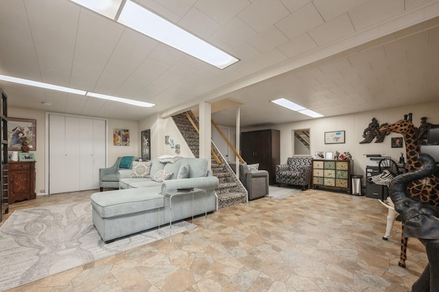 3300 Walters Ave, Wantagh, NY 11793 - living room with stairs and light stone finish floors