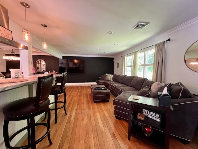 27 W Ave, Putnam Valley, NY 10579 - living room featuring ornamental molding and light wood-type flooring