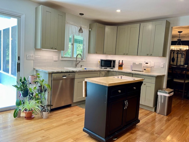 27 W Ave, Putnam Valley, NY 10579 - kitchen featuring stainless steel appliances, butcher block counters, light wood-style floors, tasteful backsplash, and recessed lighting