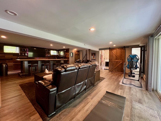 27 W Ave, Putnam Valley, NY 10579 - cinema room featuring a barn door, a dry bar, wood finished floors, and recessed lighting