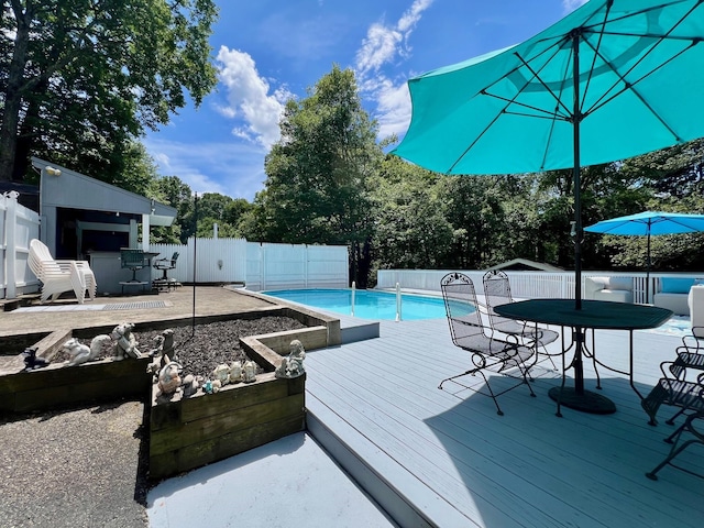 27 W Ave, Putnam Valley, NY 10579 - view of pool with a wooden deck, a fenced backyard, and outdoor dining space