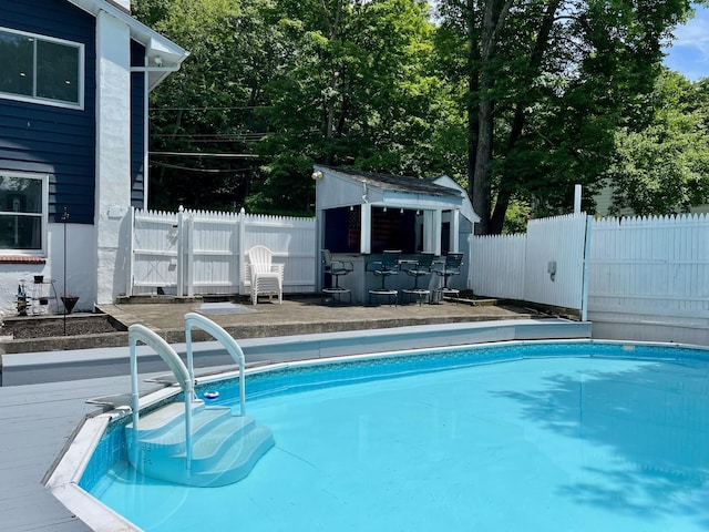 27 W Ave, Putnam Valley, NY 10579 - view of swimming pool featuring a wooden deck and an outbuilding