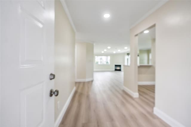 365 Seabreeze Ct, Moriches, NY 11955 - corridor featuring ornamental molding, light wood finished floors, and recessed lighting
