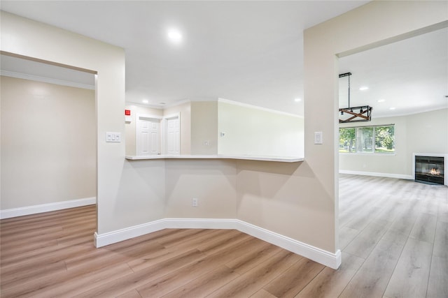 365 Seabreeze Ct, Moriches, NY 11955 - hallway with wood finished floors, recessed lighting, and ornamental molding