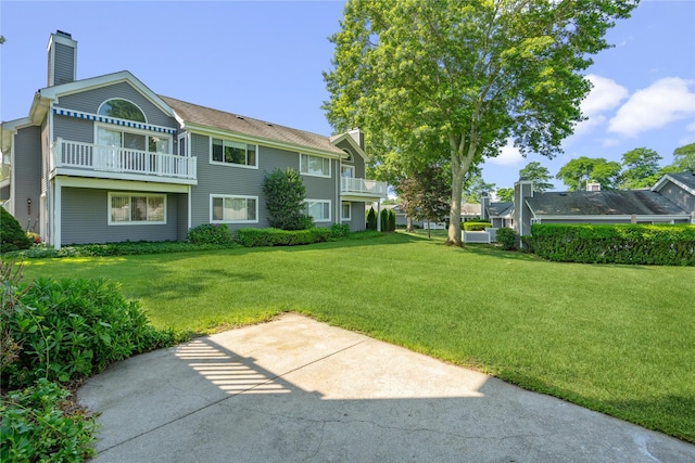 365 Seabreeze Ct, Moriches, NY 11955 - view of grassy yard with a balcony