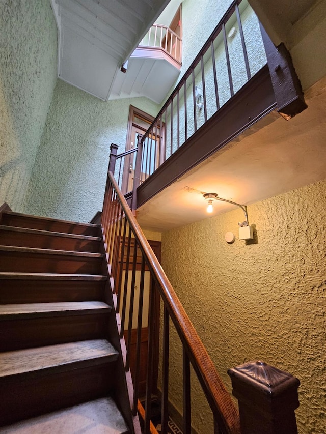 4439 Carpenter Ave, Bronx, NY 10470 - staircase with a textured wall
