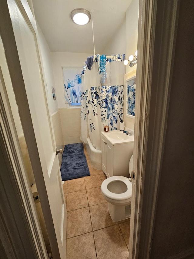 4439 Carpenter Ave, Bronx, NY 10470 - bathroom with tile patterned flooring, a shower with shower curtain, and vanity