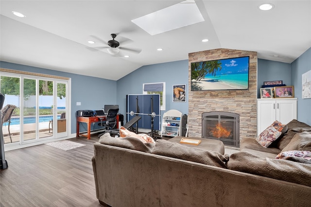 28 Lapin Ln, Blauvelt, NY 10913 - living room featuring lofted ceiling, ceiling fan, wood finished floors, an office area, and a skylight